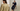Two women wearing different outfits from the Fall Winter Peppercorn collection in a minimalistic setting.
